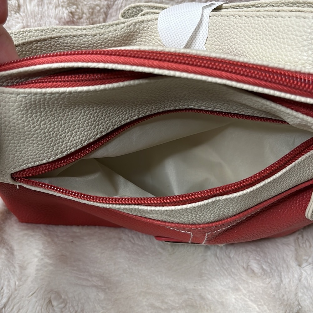 Stone & Co. two-toned crossbody. Double zipper top closure. Adjustable strap - Picture 9 of 15